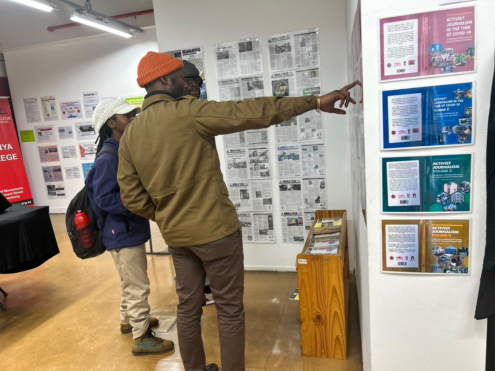 conference-participants-engage-with-exhibition-artifacts-at-khanyas-grand-opening-(Photo Karibu)